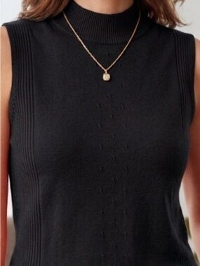 Black Sleeveless Turtleneck Top
